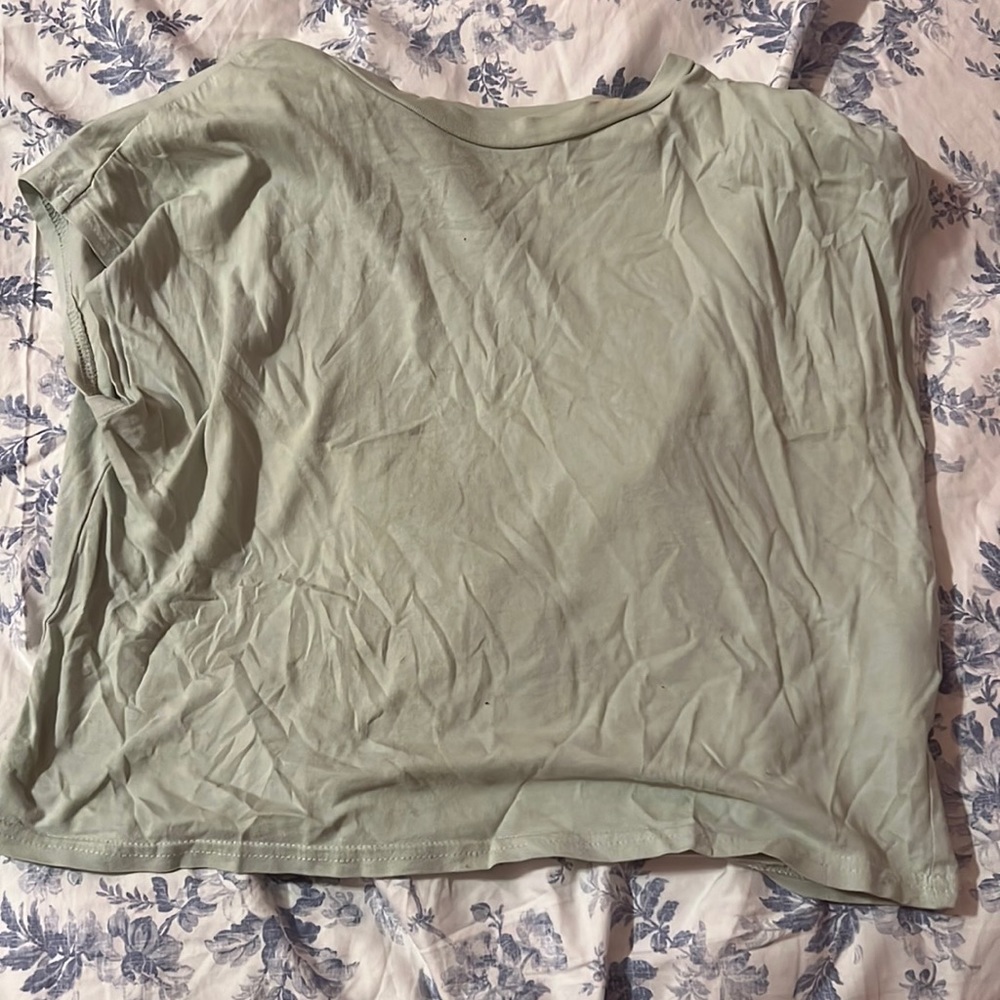 A cute t shirt but does have small hole and stain.
